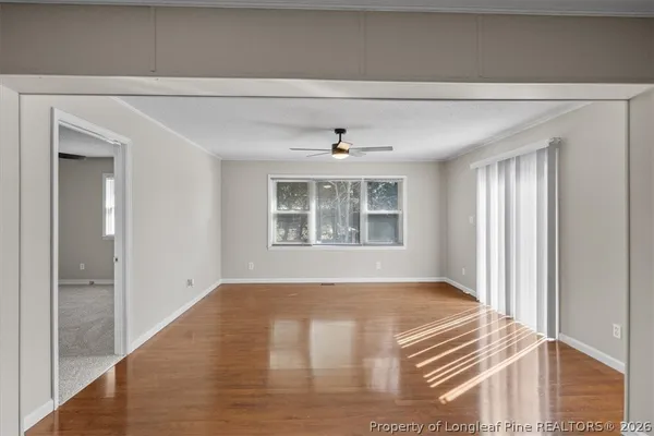 a view of an empty room with a window