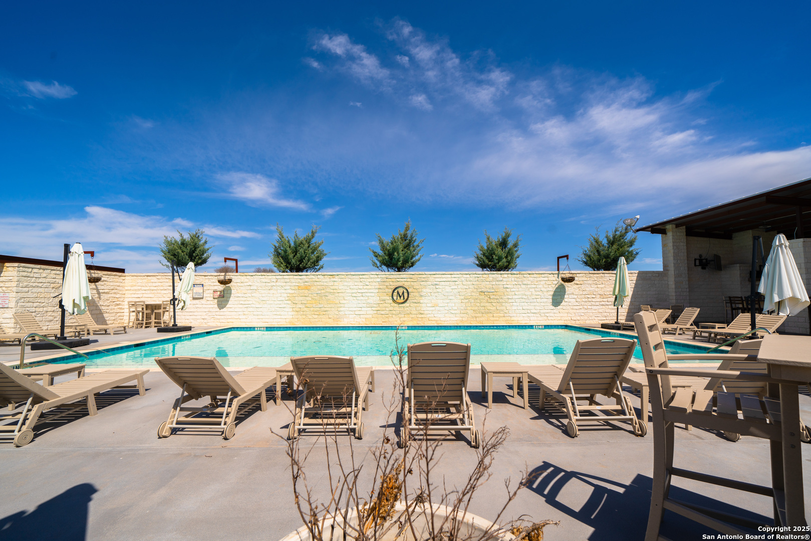 Lot 72 Fallow Drive Harper, TX 78631 - Photo 20 of 31 a roof deck with table and chairs a barbeque with potted plants