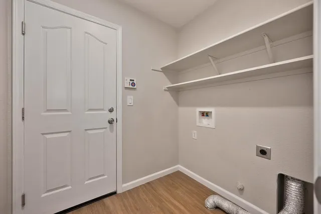 a view of a bench in the backyard