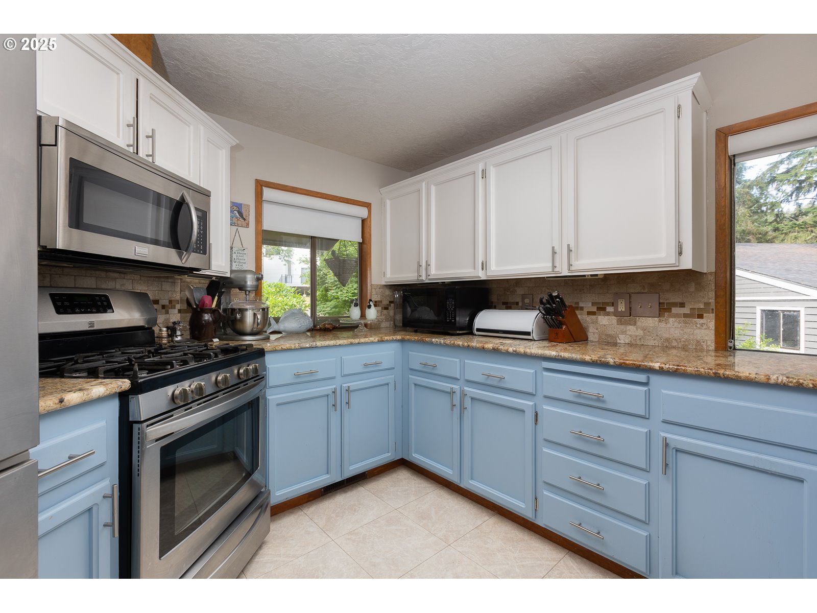 2011 Devil's Ridge Road Lincoln City, OR 97367 - Photo 15 of 24 a kitchen with granite countertop cabinets stainless steel appliances a sink and window