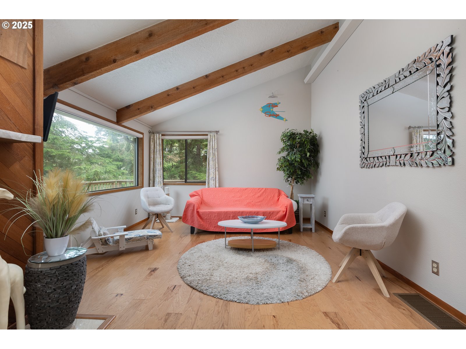 2011 Devil's Ridge Road Lincoln City, OR 97367 - Photo 3 of 24 a view of a livingroom with furniture and a potted plant