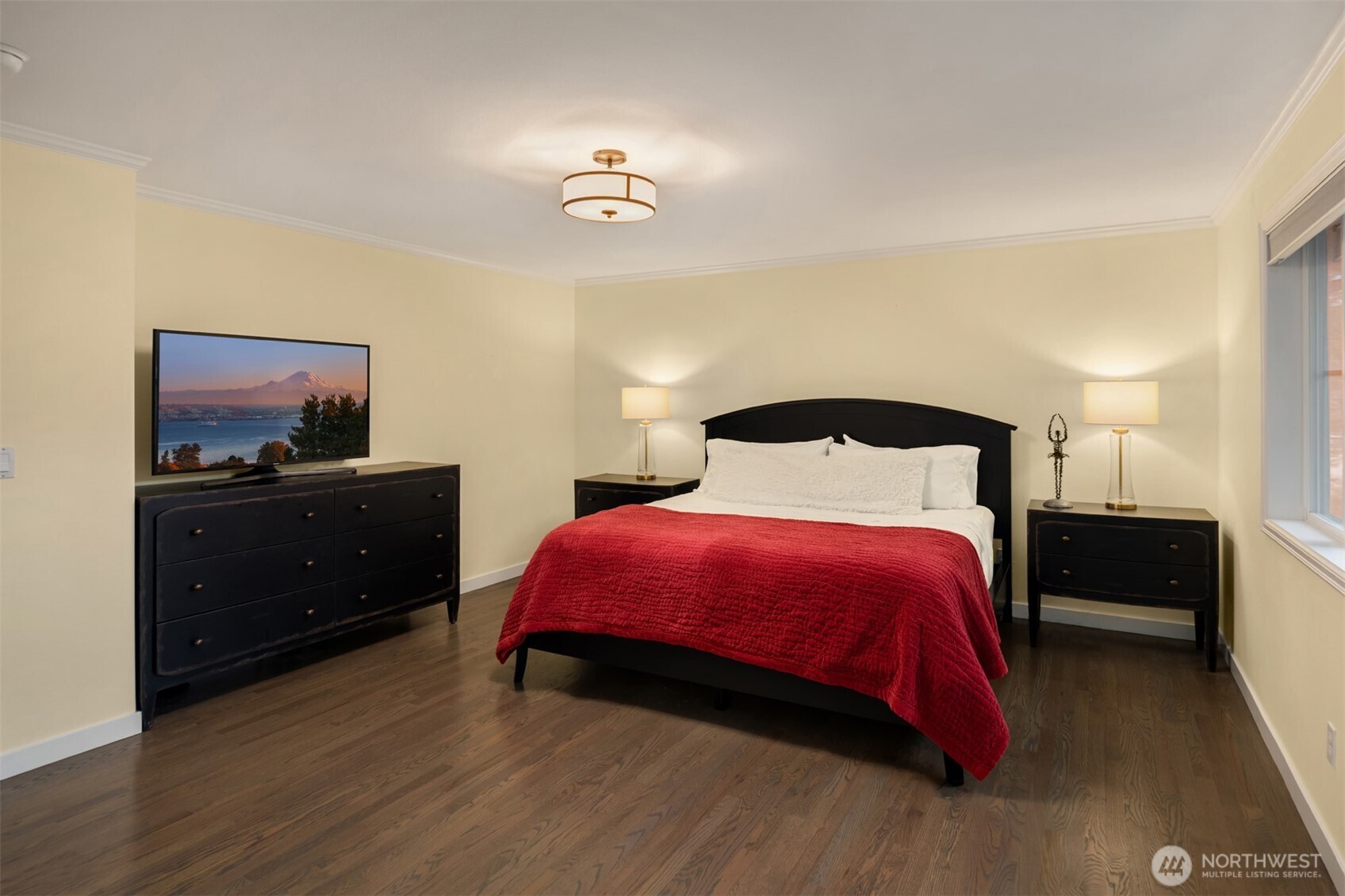 10330 Northeast 151st Place Bothell, WA 98011 - Photo 20 of 38 a bedroom with a bed and a dresser