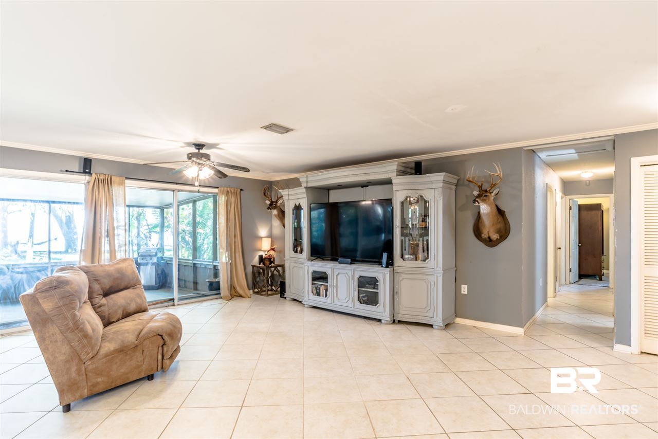 12967 West Fort Morgan Road Gulf Shores, AL 36542 - Photo 5 of 19 All new ceramic tile