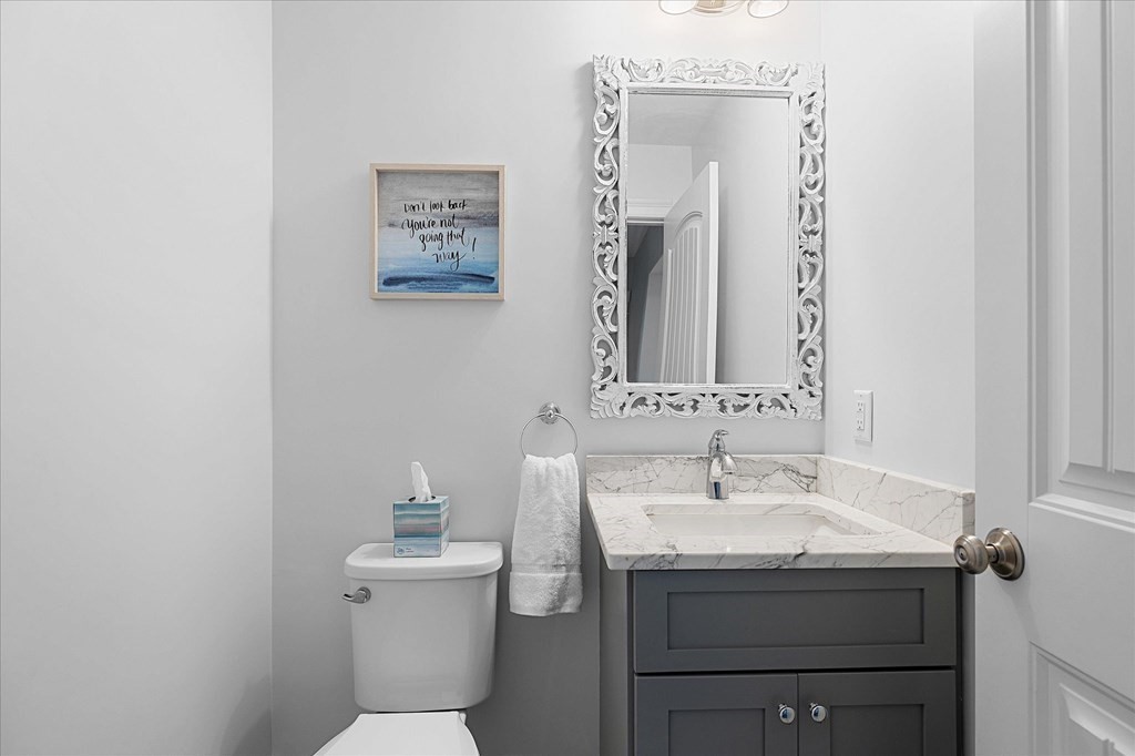 15 Tannery Road Sturbridge, MA 01518 - Photo 17 of 41 a bathroom with a sink mirror and toilet