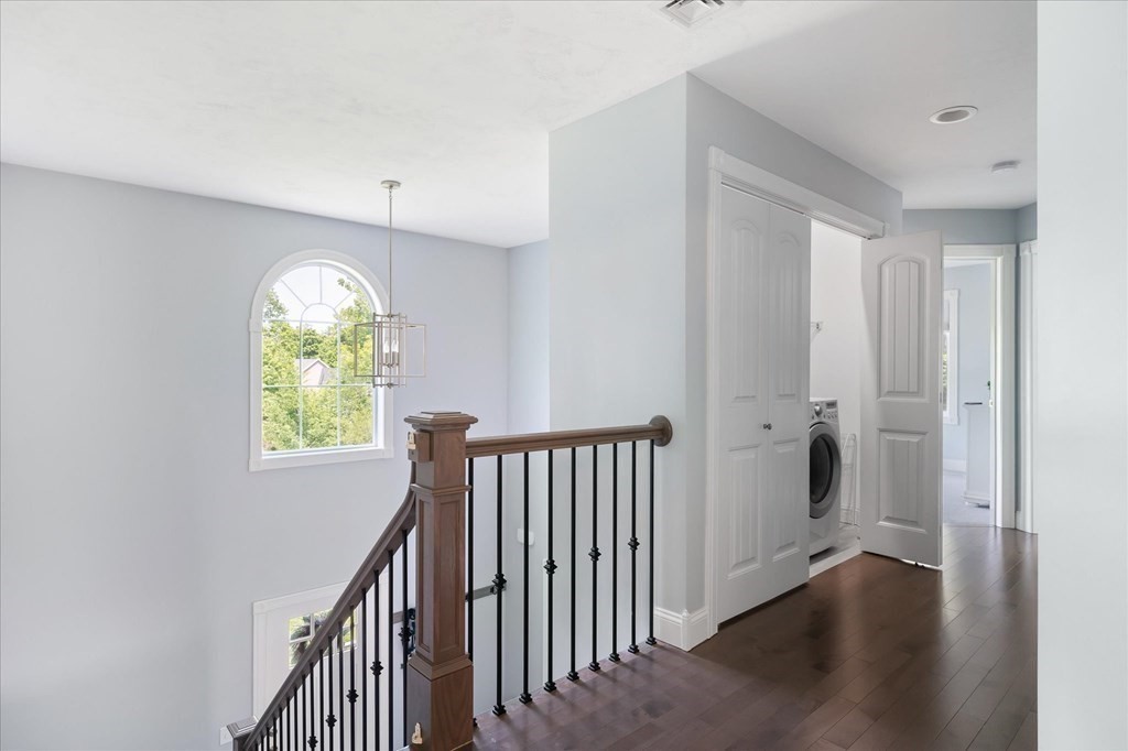 15 Tannery Road Sturbridge, MA 01518 - Photo 18 of 41 a view of hallway with stairs and wooden floor