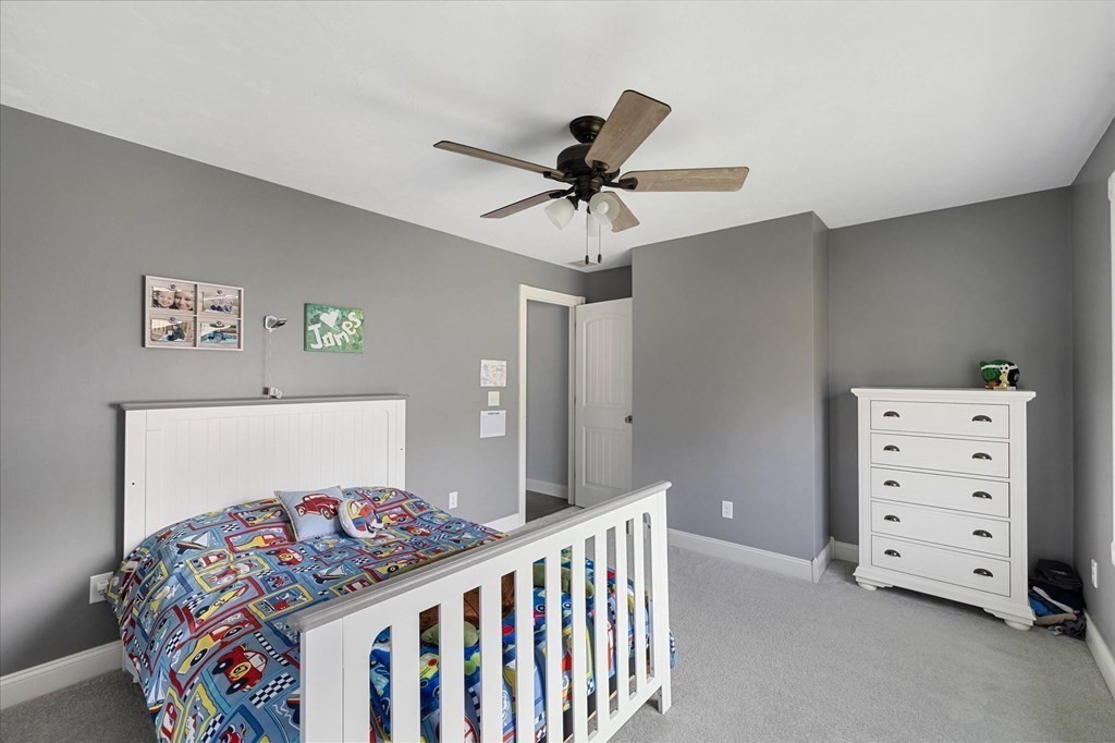 15 Tannery Road Sturbridge, MA 01518 - Photo 28 of 41 a bedroom with furniture and a baby crib
