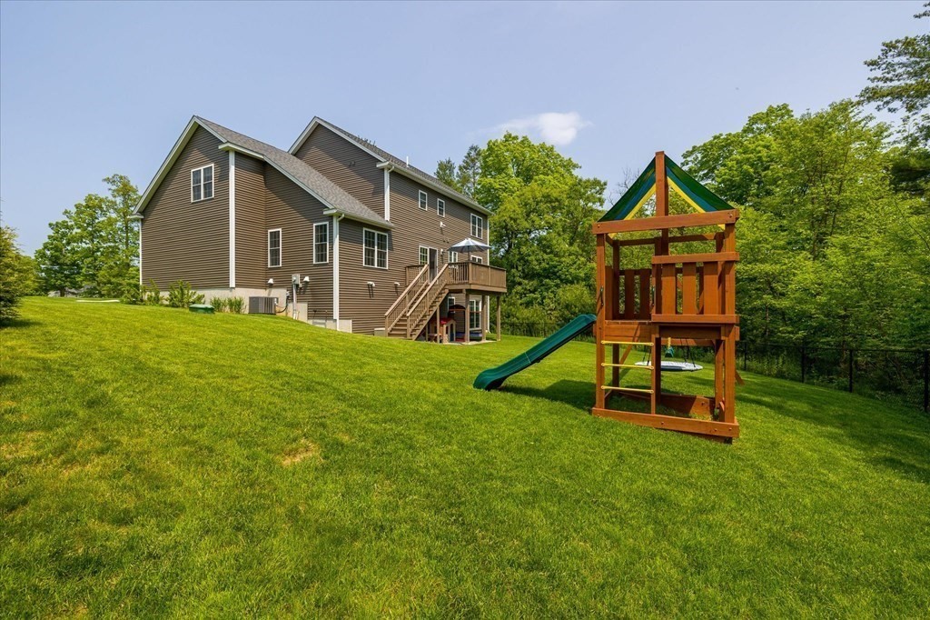 15 Tannery Road Sturbridge, MA 01518 - Photo 34 of 41 a view of a house with a yard and sitting area