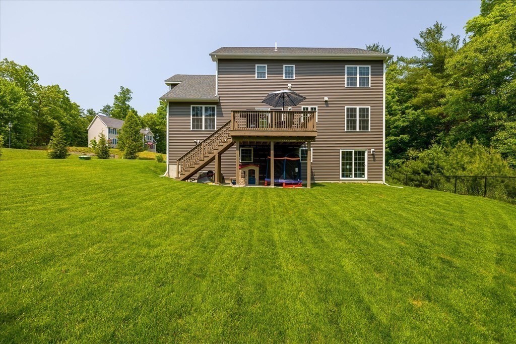 15 Tannery Road Sturbridge, MA 01518 - Photo 35 of 41 a front view of a house with yard and green space