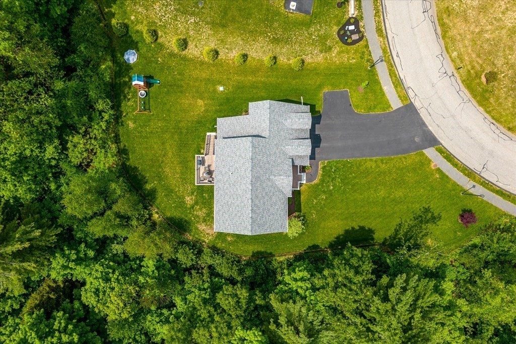 15 Tannery Road Sturbridge, MA 01518 - Photo 37 of 41 an aerial view of a house with a yard and trees