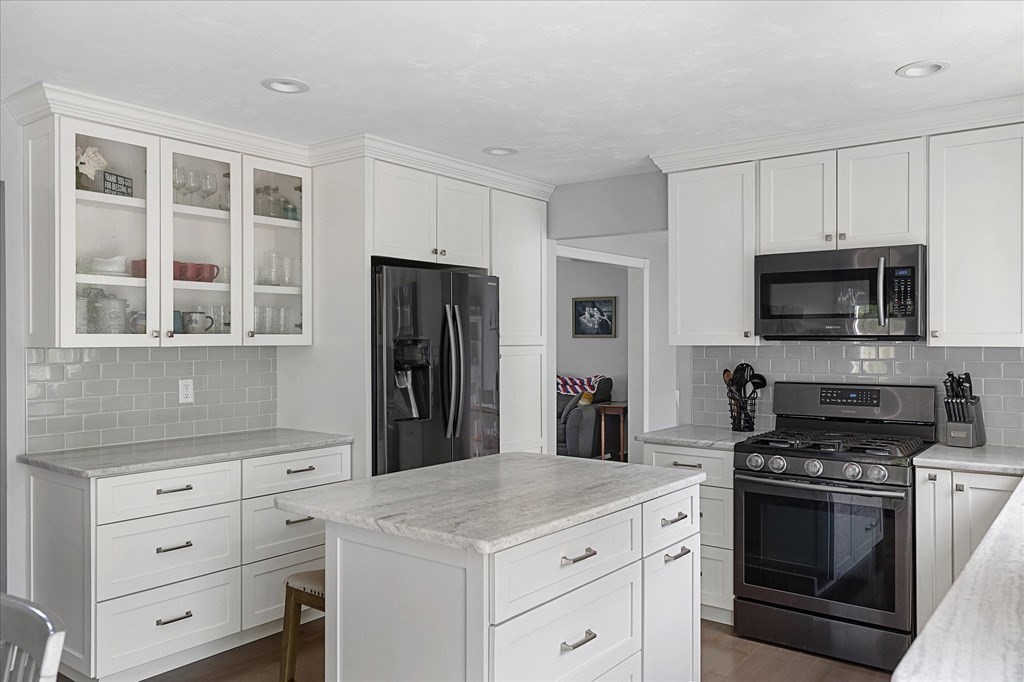 15 Tannery Road Sturbridge, MA 01518 - Photo 5 of 41 a kitchen with a stove microwave and refrigerator