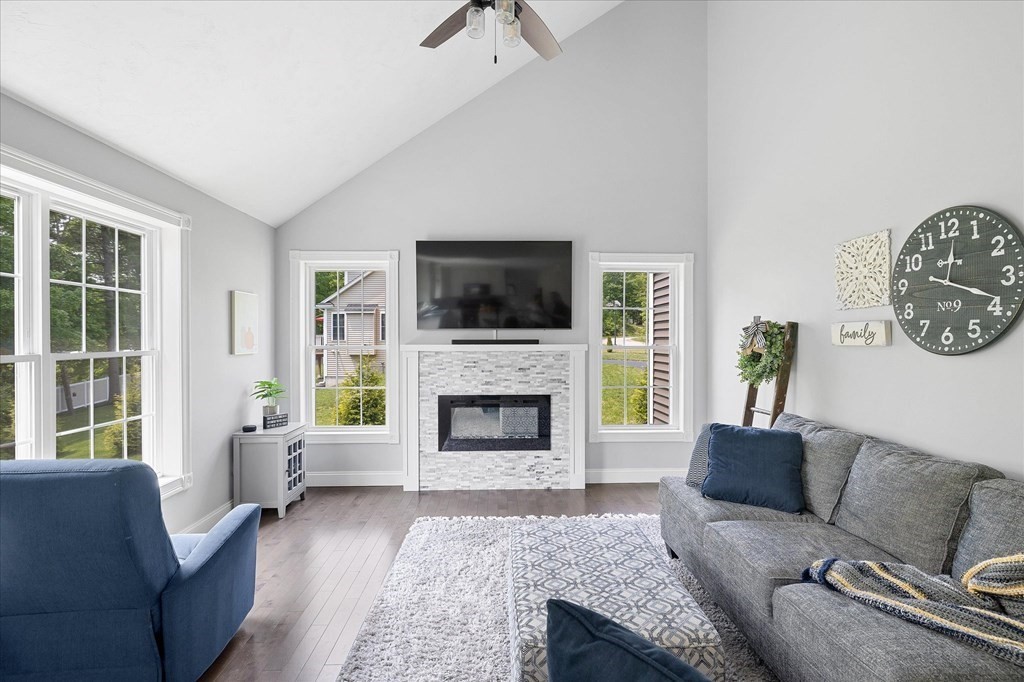15 Tannery Road Sturbridge, MA 01518 - Photo 9 of 41 a living room with furniture a window and a fireplace