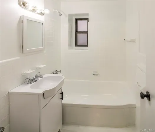 a bathroom with a sink and a bathtub