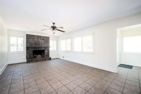 a view of an empty room and window