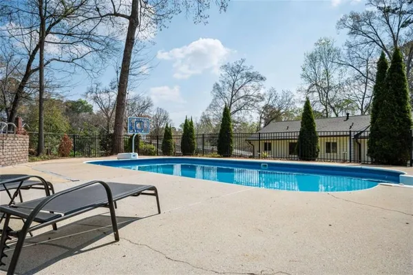 a front view of house with yard patio and green space