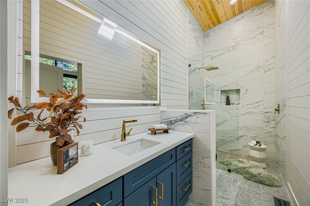 4096 Tyrol Way Mount Charleston, NV 89124 - Photo 11 of 50 This is the 2nd upstairs bath. with massively high ceilings with south facing skylight, there's nothing quite like taking a shower in this amazing space. Let the full natural sunlight bathe you while you take a mid-afternoon shower. The natural warmth of the sunlight. All bathrooms feature automatic self de-fogging mirrors, and multiple organic light settings for maximum visibility in all conditions.
