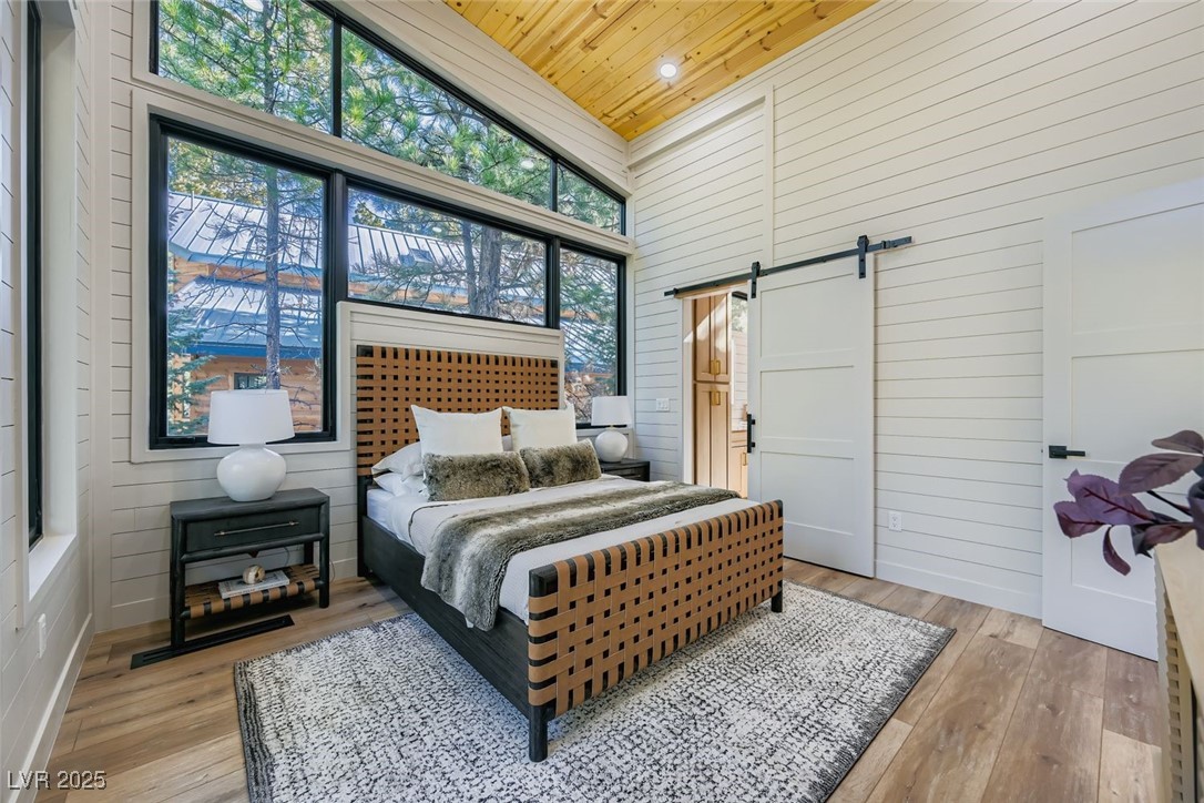 4096 Tyrol Way Mount Charleston, NV 89124 - Photo 16 of 50 Bedrooms were designed for simple elegance. Placing you inside the forest, but protected by the warmth of the 7th Heaven mountain home.