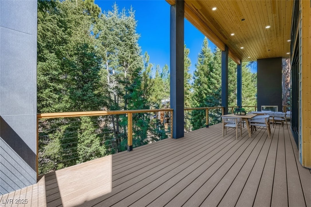 4096 Tyrol Way Mount Charleston, NV 89124 - Photo 21 of 50 Forest & Mountain peak views from all areas of the deck. Mt. Charleston peak on one side and Cathedral Rock on the other.
