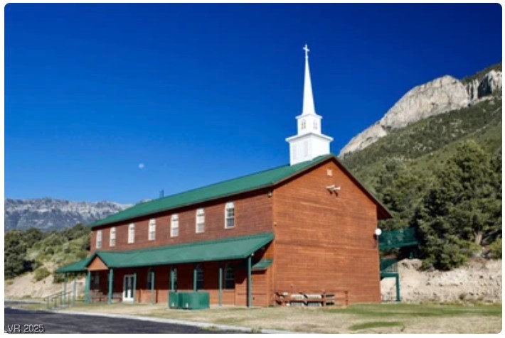 4096 Tyrol Way Mount Charleston, NV 89124 - Photo 27 of 50 The charming mountain chapel stands as a peaceful landmark in the Rainbow Canyon community. Surrounded by nature and hiking trails like Mary Jane Falls and the Bristlecone Loop, this area perfectly blends mountain living with outdoor recreation.