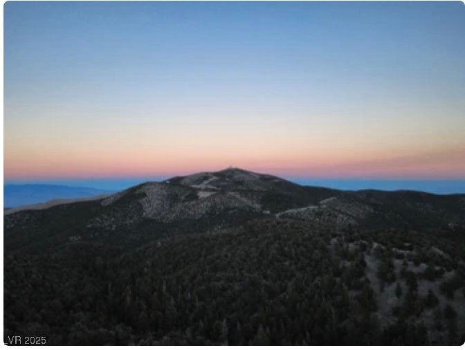 4096 Tyrol Way Mount Charleston, NV 89124 - Photo 40 of 50 Golden hour paints the mountain silhouettes in warm, ethereal light creating magical moments. After a day exploring trails like Fletcher Canyon or Mary Jane Falls, these stunning sunsets reward outdoor enthusiasts with unforgettable natural beauty.
