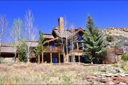 300 Horse Mountain Ranch Road Wolcott, CO 81655 - Photo 2 of 19 a view of a house with a snow in the background