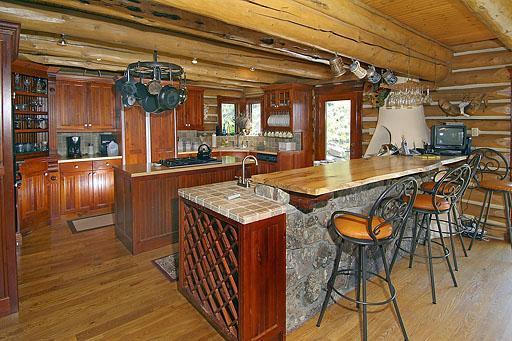 300 Horse Mountain Ranch Road Wolcott, CO 81655 - Photo 7 of 19 a view of a kitchen and dining room