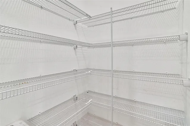 a view of a room with racks on the wall