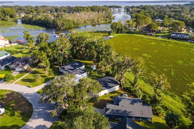 a view of a lake with a building in the background