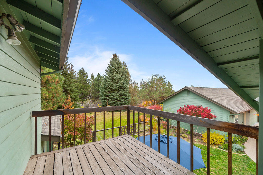 62508 Quail Ridge Road Bend, OR 97701 - Photo 28 of 36 a view of wooden balcony and outdoor space