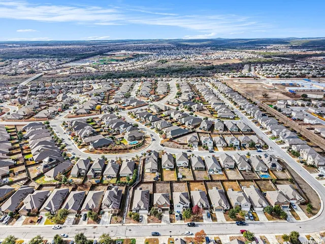 an aerial view of a building with outdoor space