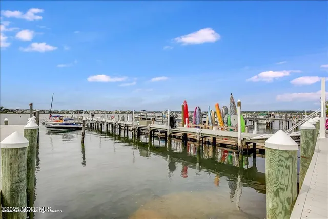 a front view of a building with a garden