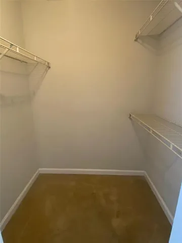 a view of a room with racks on the wall