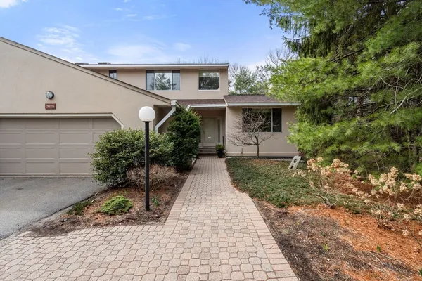 a view of a back yard of the house