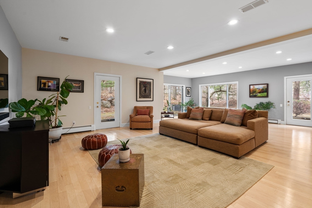 202 Allandale Road, Unit B Boston, MA 02467 - Photo 26 of 39 a living room with furniture and a potted plant