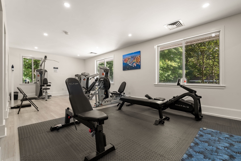 202 Allandale Road, Unit B Boston, MA 02467 - Photo 36 of 39 a view of a livingroom with workspace and a window