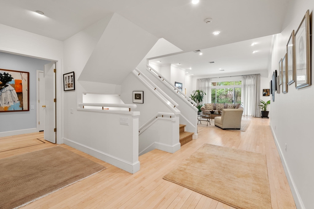 202 Allandale Road, Unit B Boston, MA 02467 - Photo 5 of 39 a view of a livingroom with furniture and windows