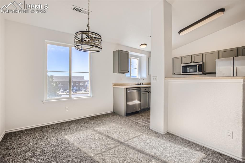 3764 Riviera Grove, Unit 203 Colorado Springs, CO 80922 - Photo 23 of 31 a view of kitchen and window