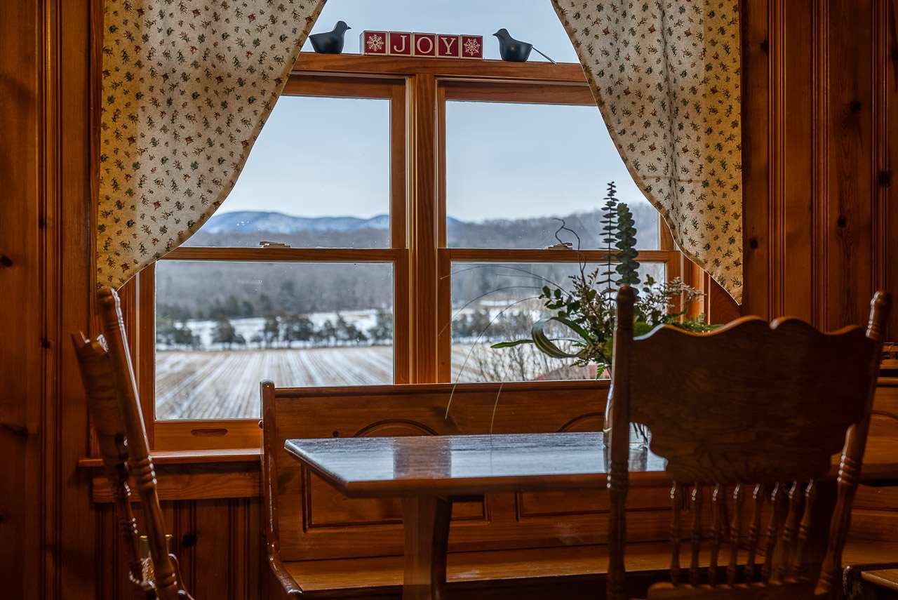4273 Rockfish Road Grottoes, VA 24441 - Photo 11 of 48 a view of a balcony with a table and chairs