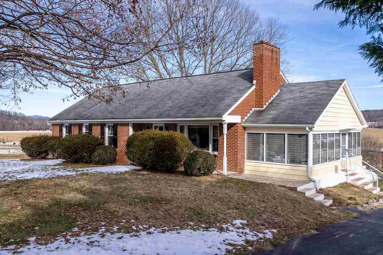 4273 Rockfish Road Grottoes, VA 24441 - Photo 2 of 48 a front view of a house with a garden