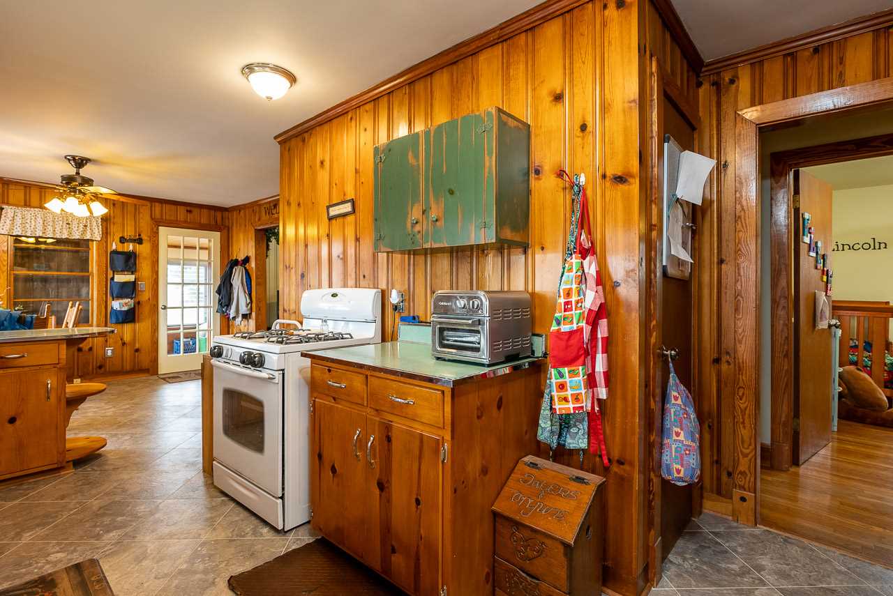 4273 Rockfish Road Grottoes, VA 24441 - Photo 21 of 48 a kitchen that has a lot of fruit on it and cabinets