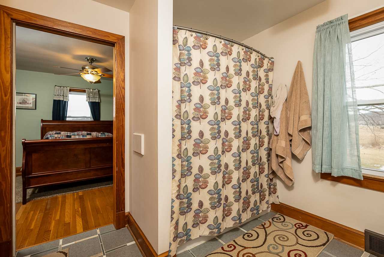 4273 Rockfish Road Grottoes, VA 24441 - Photo 25 of 48 a view of walk in closet with wooden floor
