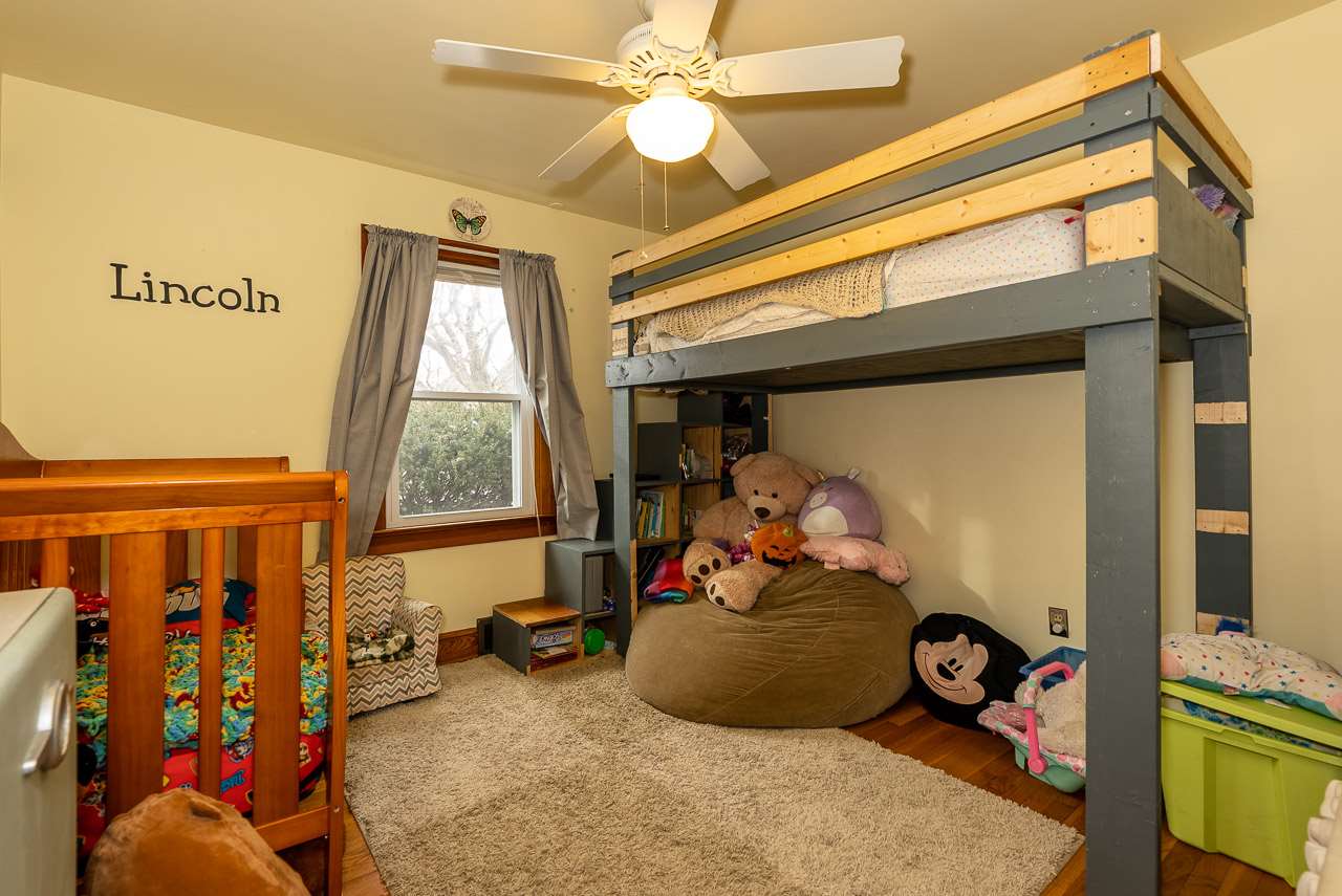 4273 Rockfish Road Grottoes, VA 24441 - Photo 29 of 48 a bedroom with furniture and a large window