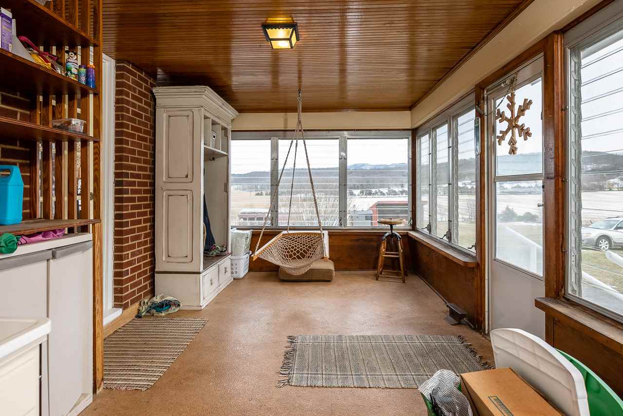 4273 Rockfish Road Grottoes, VA 24441 - Photo 35 of 48 a living room with furniture and a floor to ceiling window