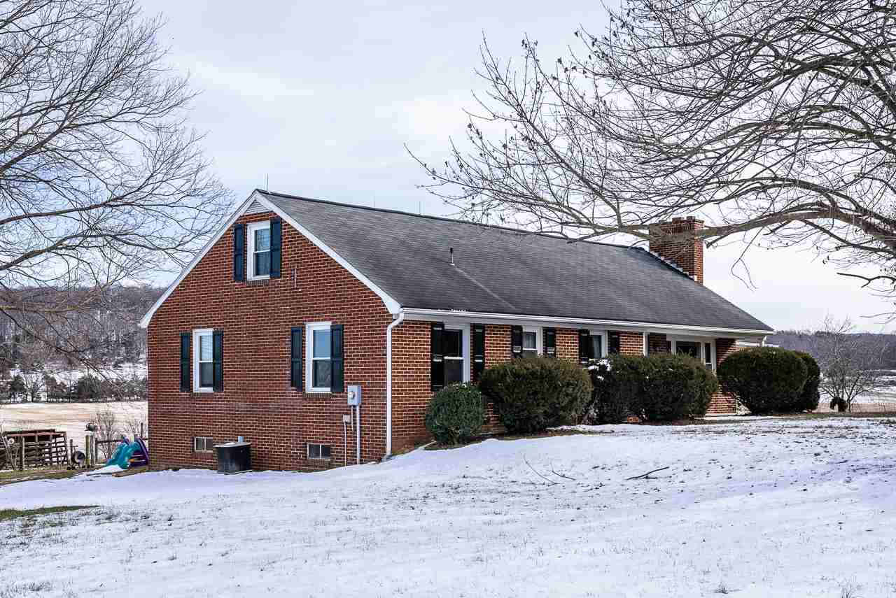 4273 Rockfish Road Grottoes, VA 24441 - Photo 38 of 48 a front view of a house with a yard