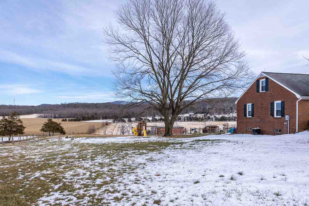 4273 Rockfish Road Grottoes, VA 24441 - Photo 39 of 48 a view of house with a yard covered with snow in front of house