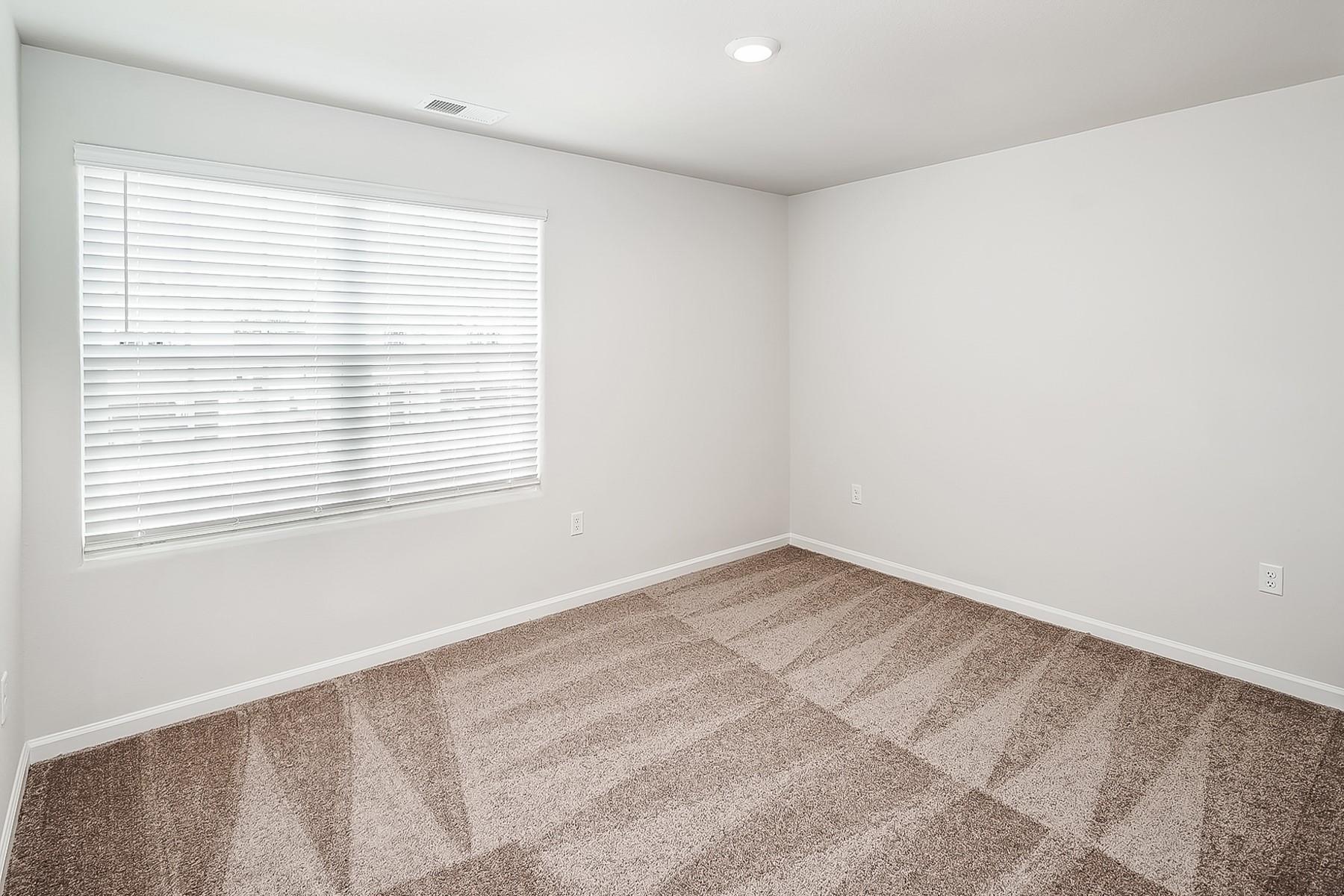 1301 Nia Road Charlotte, NC 28215 - Photo 13 of 15 a view of an empty room with a window