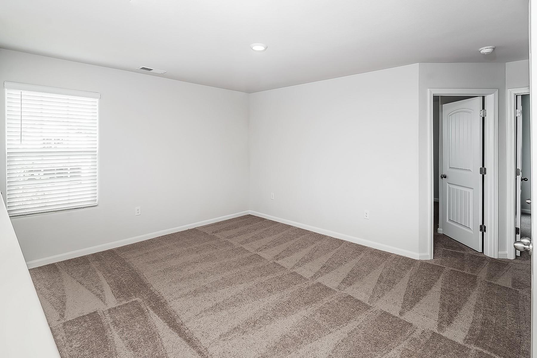 1301 Nia Road Charlotte, NC 28215 - Photo 7 of 15 an empty room with a natural light