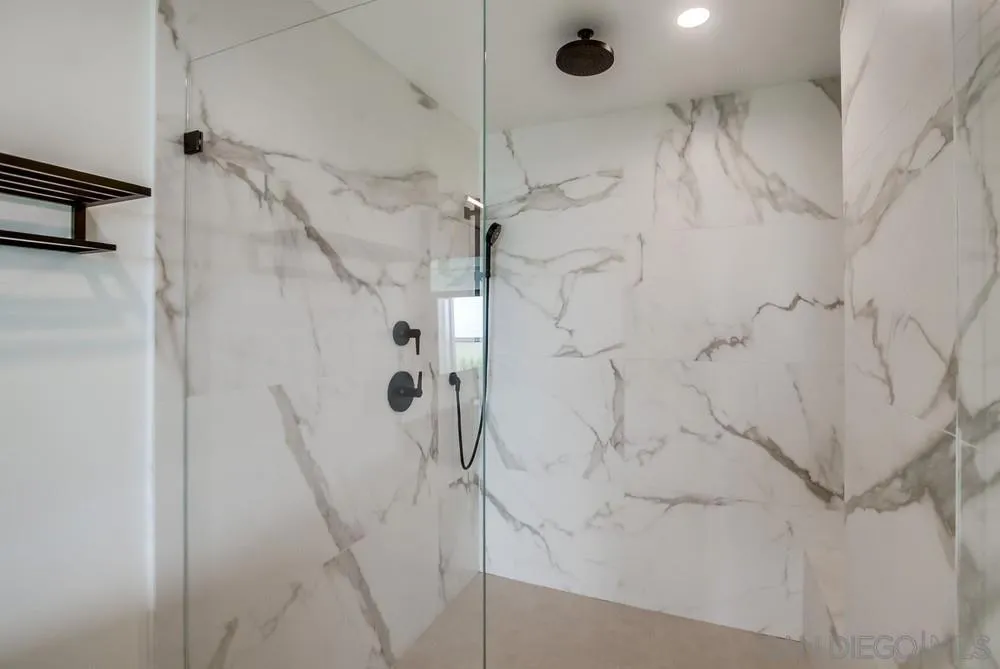 14066 Crest Way Del Mar, CA 92014 - Photo 14 of 32 a bathroom with a shower