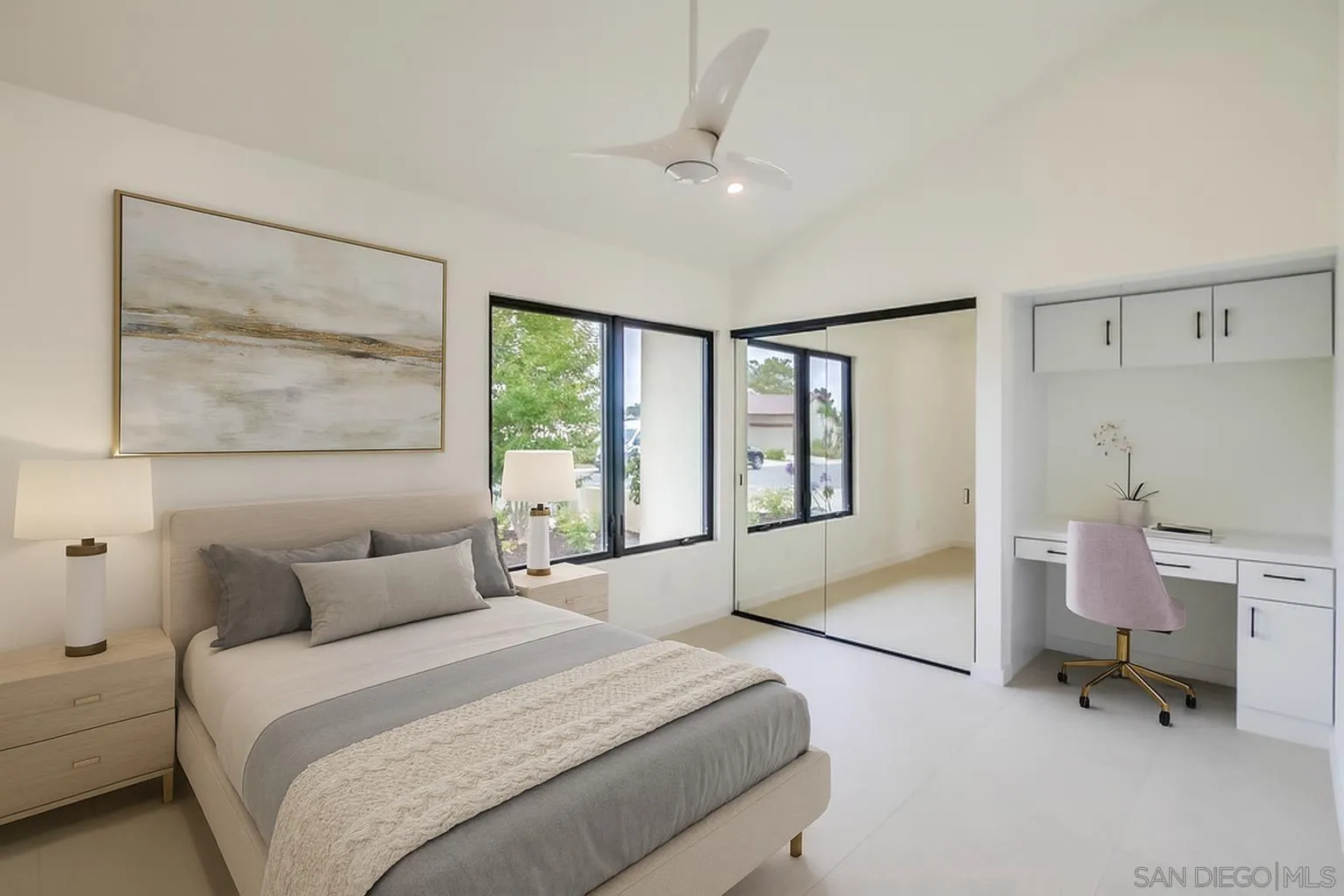 14066 Crest Way Del Mar, CA 92014 - Photo 22 of 32 a bedroom with a large bed and a window