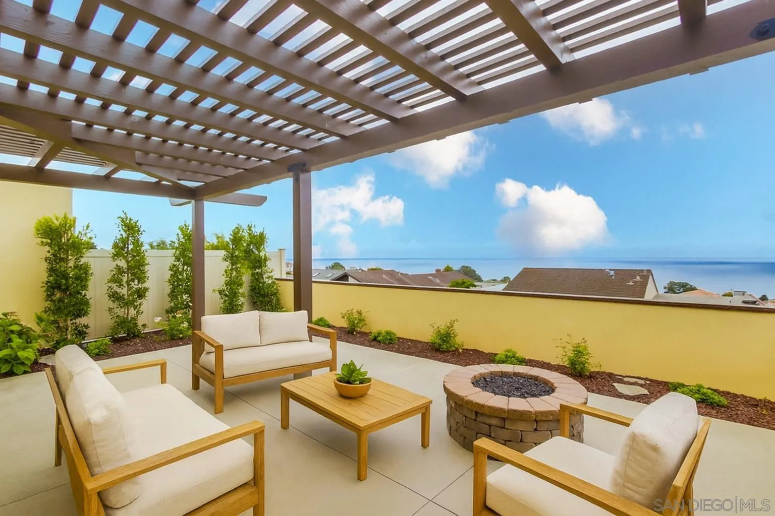14066 Crest Way Del Mar, CA 92014 - Photo 26 of 32 a view of a terrace with couches and pool
