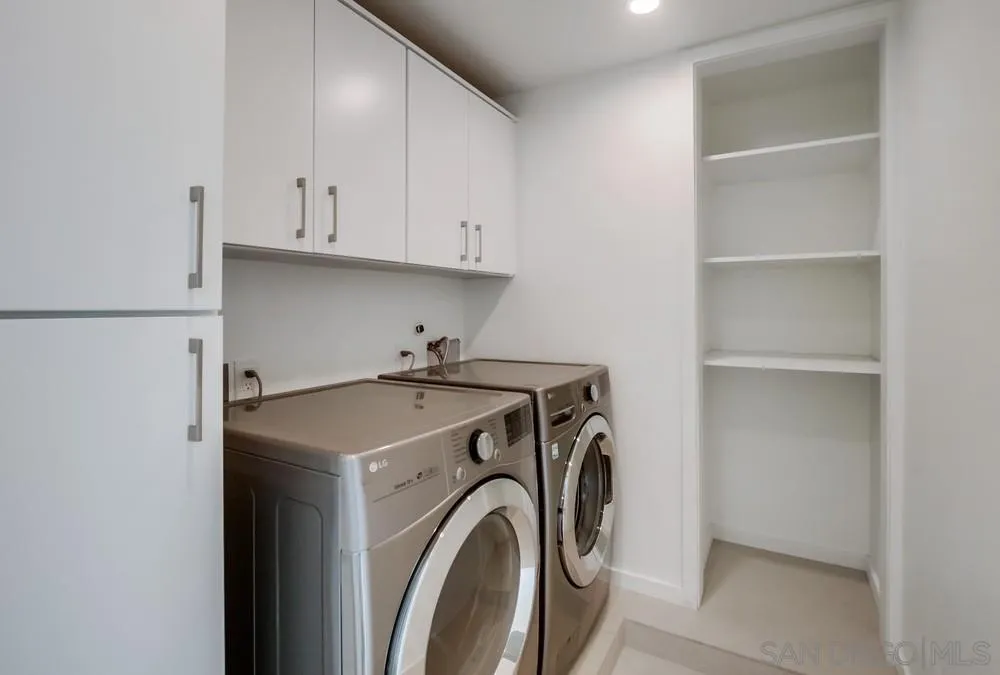 14066 Crest Way Del Mar, CA 92014 - Photo 32 of 32 a utility room with dryer and washer